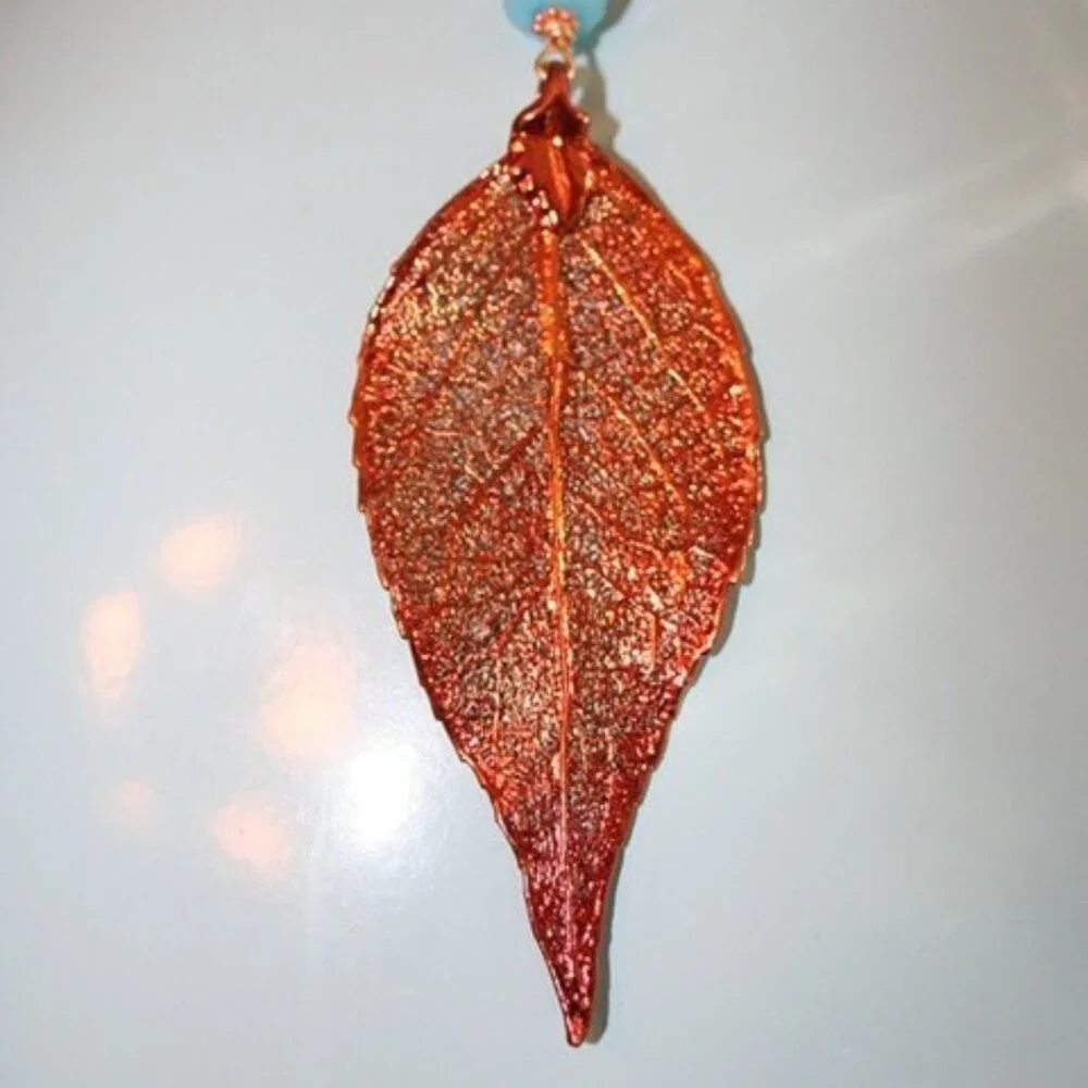 Hand made gold necklace with‎ gold and blue fresh water pearls